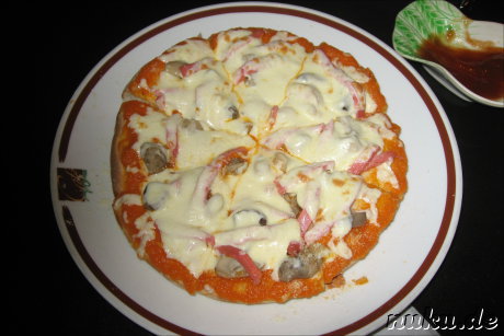 Pizza, oder: So sieht vermutlich fluessiger Analogkaese aus.