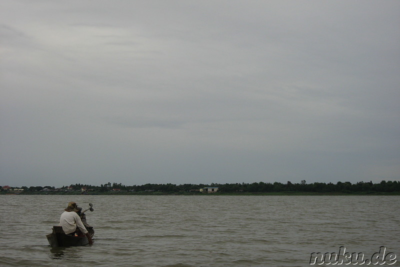 Winziges Boot auf dem Mekong